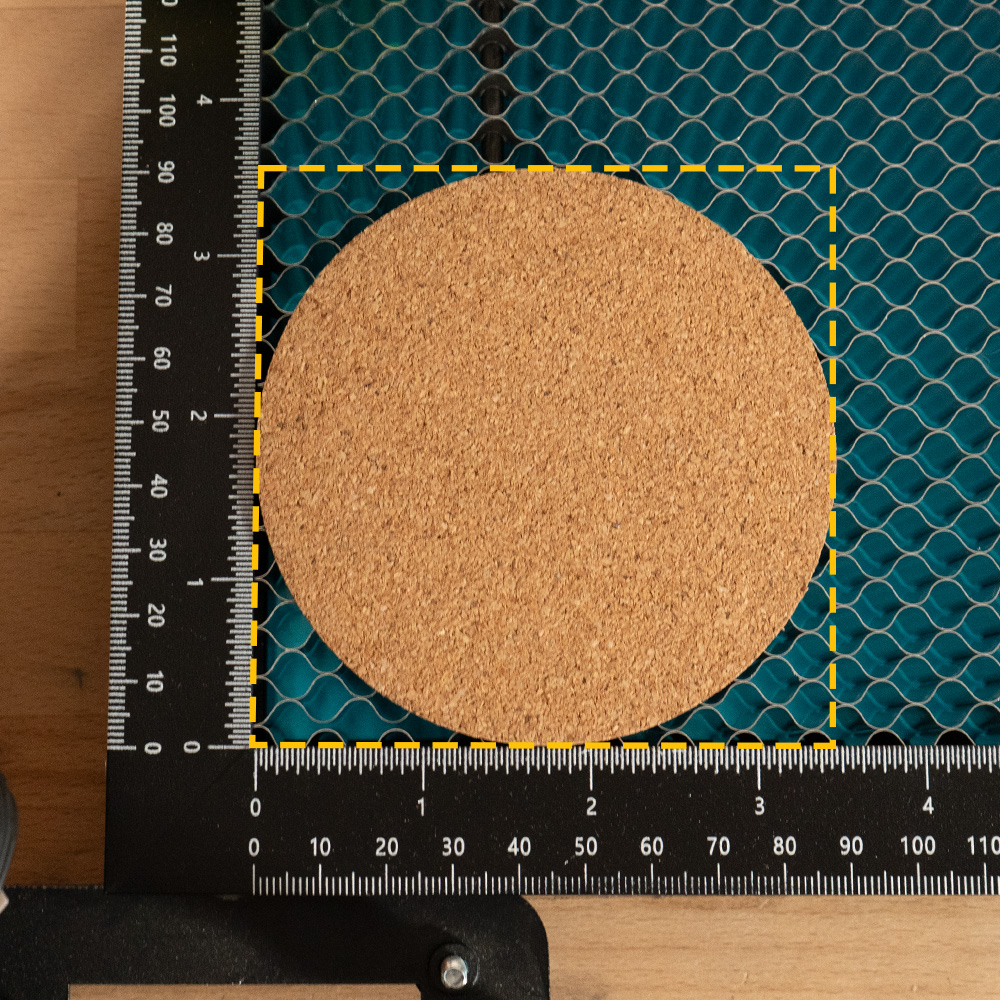 Perimeter test: dashed engraving boundary skimming the cork disc edge